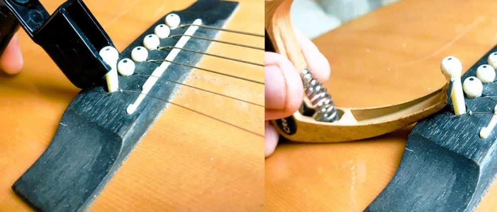 Removing a guitar bridge pin using a string winder and capo with a bridge pin pulling function.